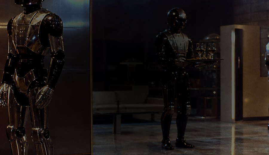 Black and silver Scarab robots in a private studio